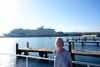 Brenda on the Catamaran deck looking back toward our ship (Falmouth, Jamaica).