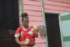 Our tour guide explains how to make chocolate from a coca plant in St. Lucia.