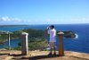 Vernon taking photo of view of St. Johns, Antigua.