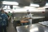 One of the kitchens (there are 3 major ones).  Preparing shrimp appetizers.