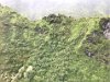 Flying up and over the reak of a mountain