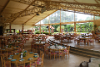 Seating for dinner and to watch the show at Kilohana Plantation